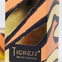 A box with a golden foil resembling the skin of a tiger.