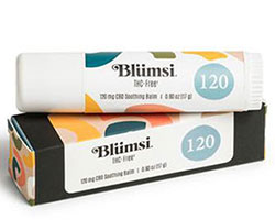 Black and white lip balm box with white lip balm from "Blumsi".