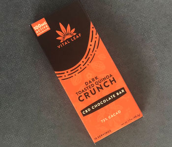 Black and orange package for a CBD chocolate bar from Vital Leaf.