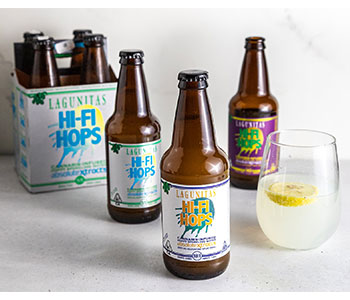 Glass bottles with white labels that read "Hi-Fi Hops".