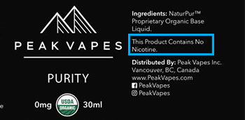 A black label of "Peak Vapes" displaying ingredients and other details.