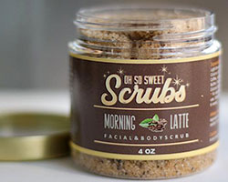 Small glass jar with brown label that reads "Scrubs".