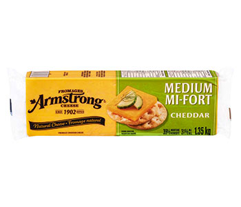 Yellow and green rectangular box displaying cheddar biscuits and reads "Armstrong Medium Mi-Fort Cheddar".