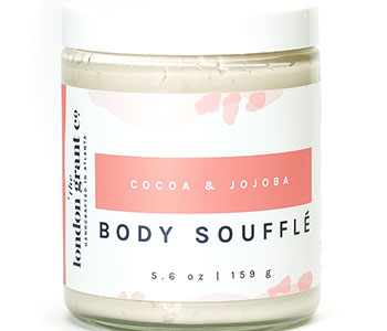 Glass container with white lid and label that reads "Body souffle".