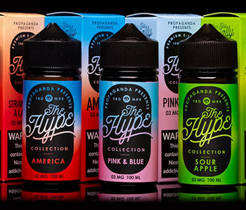 Colorful containers of vape essences with black lids and boxes.