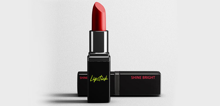 Black container of red lipstick that reads "Shine Bright".