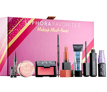 Big pink Sephora box with different makeup products.