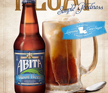 A glass bottle of root beer with blue label that reads "Abita" and a pint of beer.
