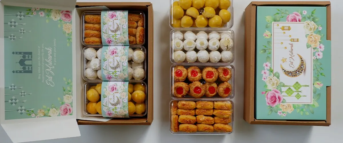 three boxes of different style cookies