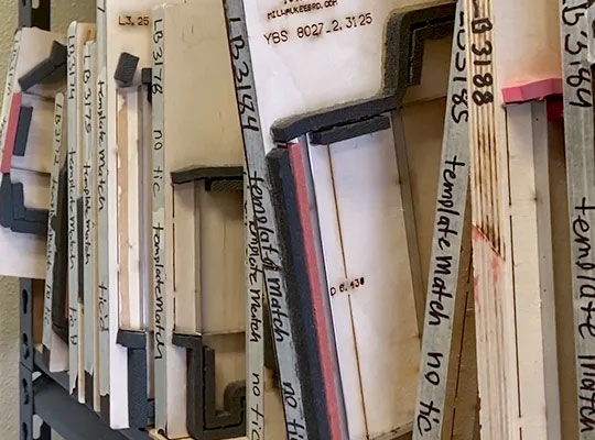 Cutting dies on shelf